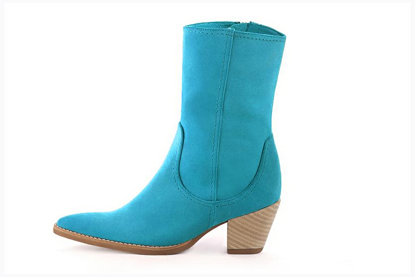 Turquoise blue women's ankle boots with a zip on the inside. Tapered toe. Medium cone heels. Profile view - Florence KOOIJMAN